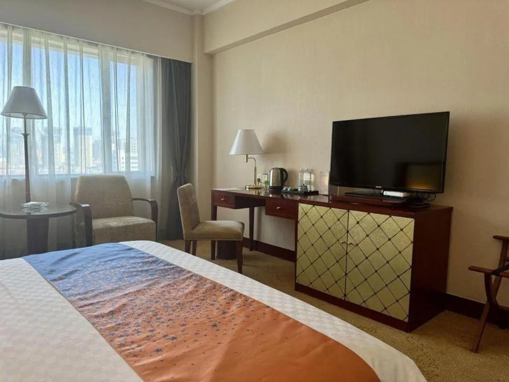 Bed in Kunming Jinjiang Hotel