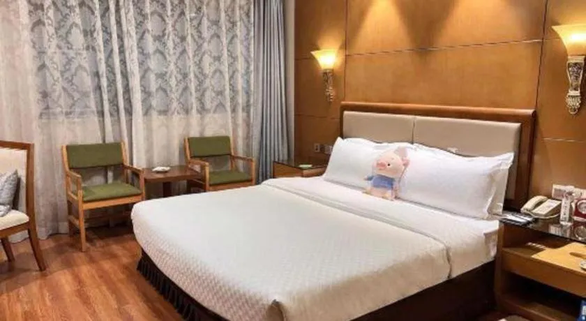 Bed in Kunming Jinjiang Hotel