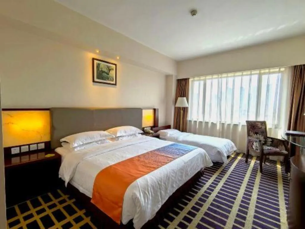 Bed in Kunming Jinjiang Hotel