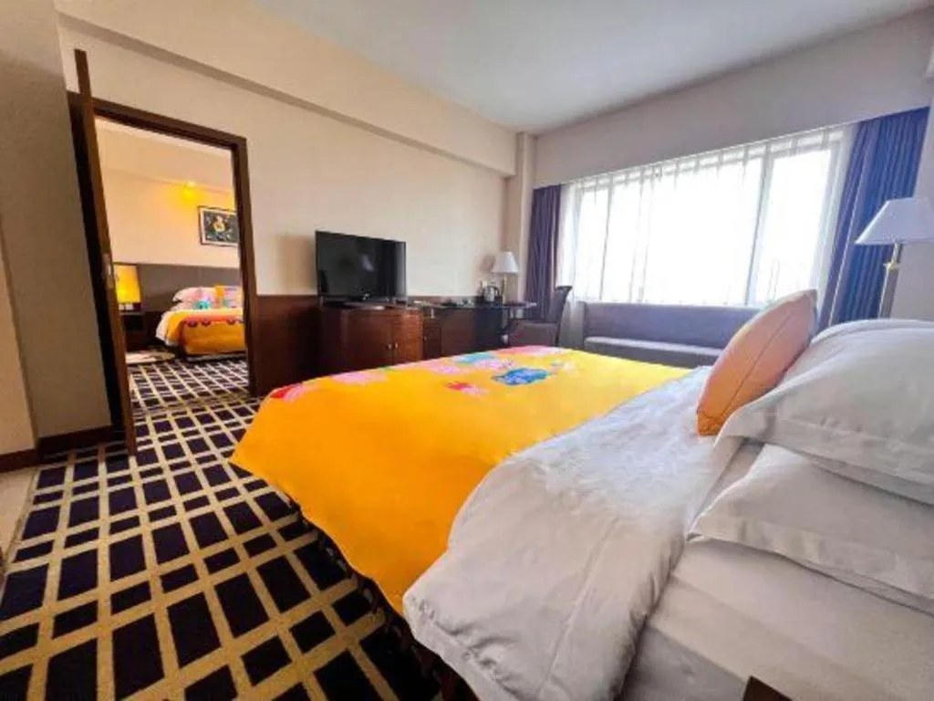 Bed in Kunming Jinjiang Hotel