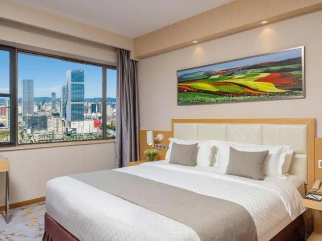 Bed in Kunming Jinjiang Hotel