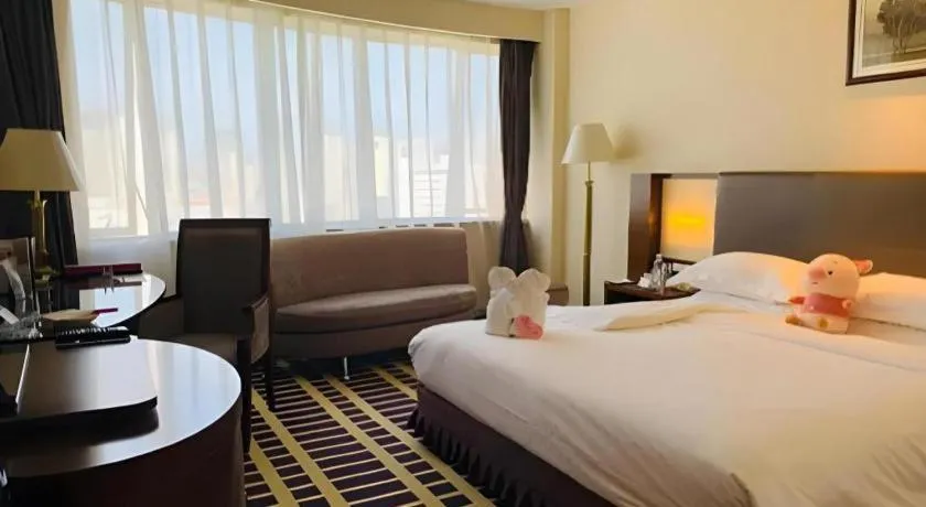 Bed in Kunming Jinjiang Hotel