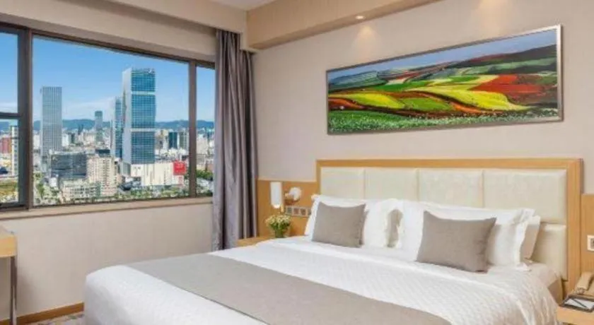 Bed in Kunming Jinjiang Hotel