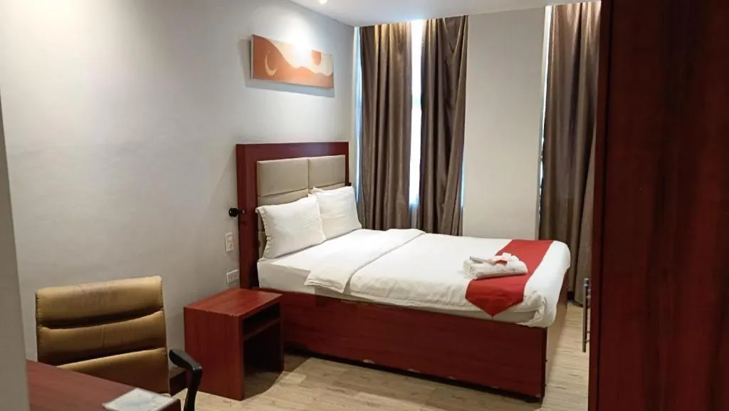 Bed in Cherry Midtown Hotel