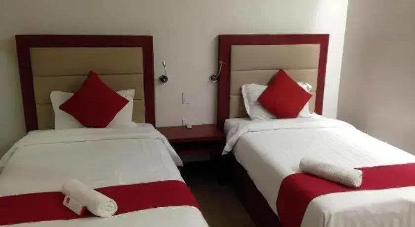 Bed in Cherry Midtown Hotel Bed in Cherry Midtown Hotel