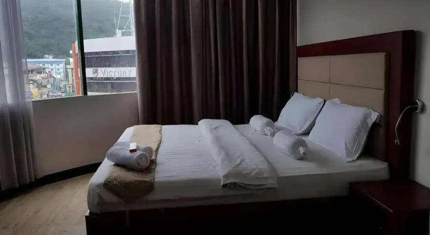 Bed in Cherry Midtown Hotel Bed in Cherry Midtown Hotel