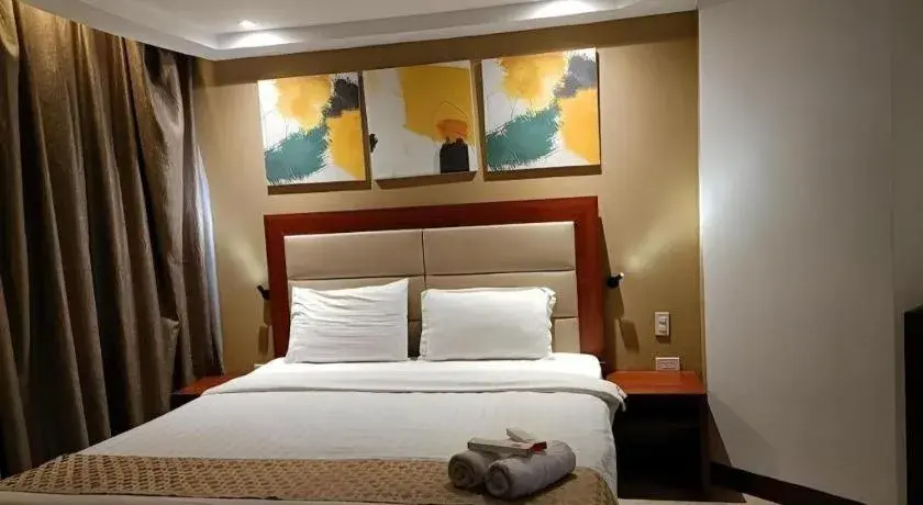 Bed in Cherry Midtown Hotel Bed in Cherry Midtown Hotel