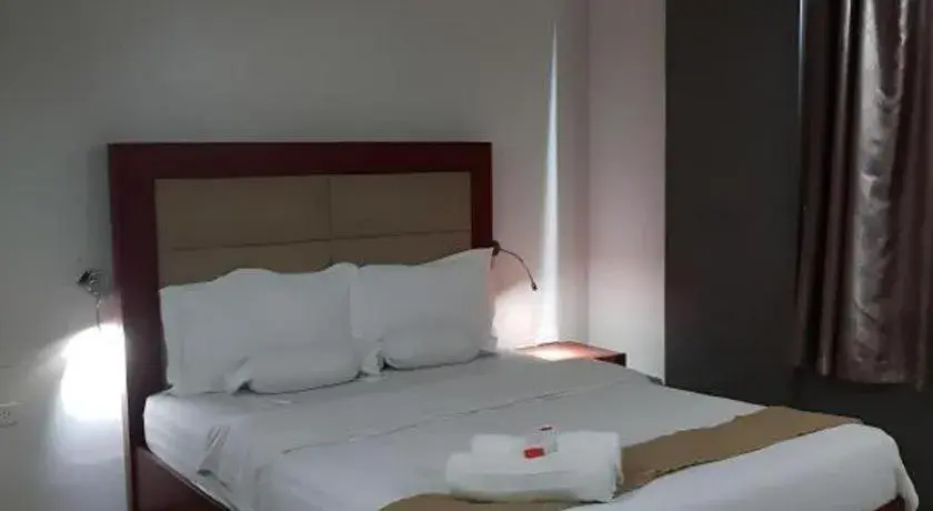 Bed in Cherry Midtown Hotel Bed in Cherry Midtown Hotel