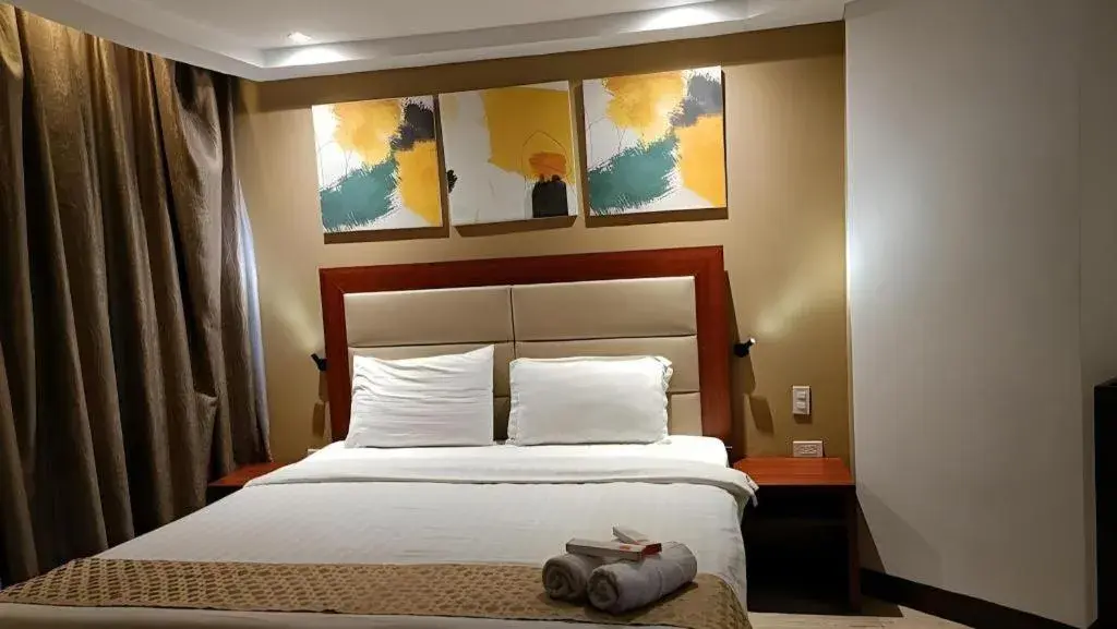 Bed in Cherry Midtown Hotel Bed in Cherry Midtown Hotel