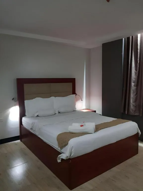 Bed in Cherry Midtown Hotel