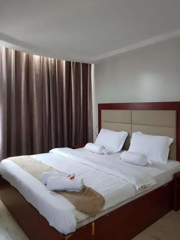 Bed in Cherry Midtown Hotel