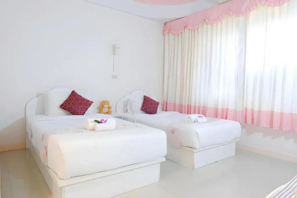 Bed in Wiangphumin Hotel Bed in Wiangphumin Hotel