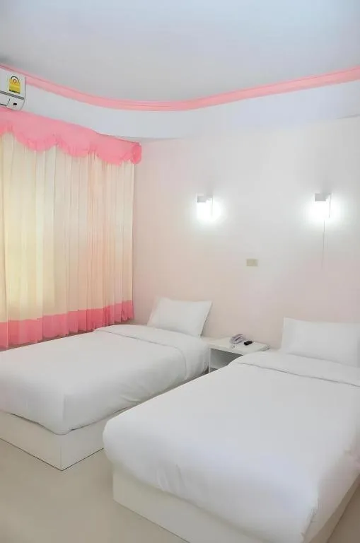 Bed in Wiangphumin Hotel