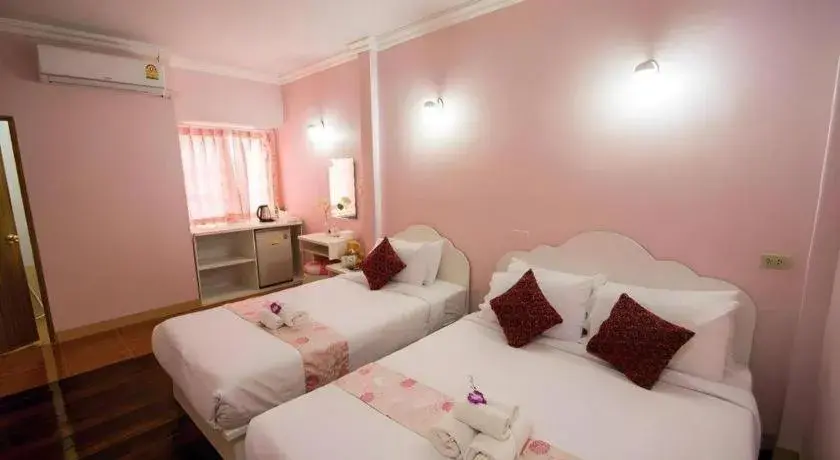 Bed in Wiangphumin Hotel Bed in Wiangphumin Hotel