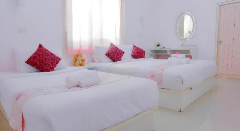 Bed in Wiangphumin Hotel