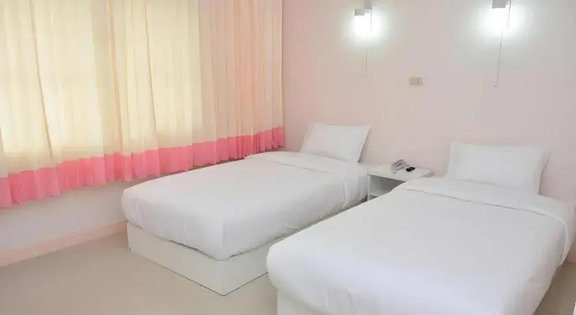 Bed in Wiangphumin Hotel Bed in Wiangphumin Hotel