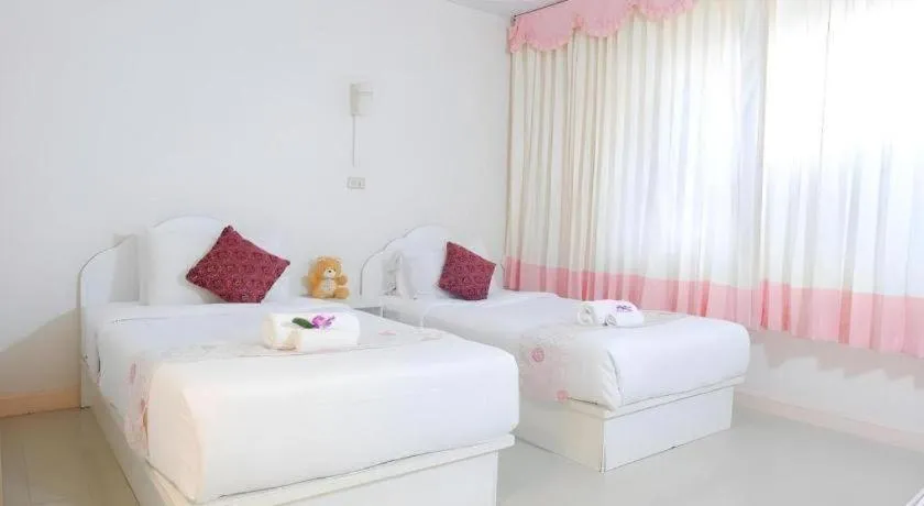 Bed in Wiangphumin Hotel