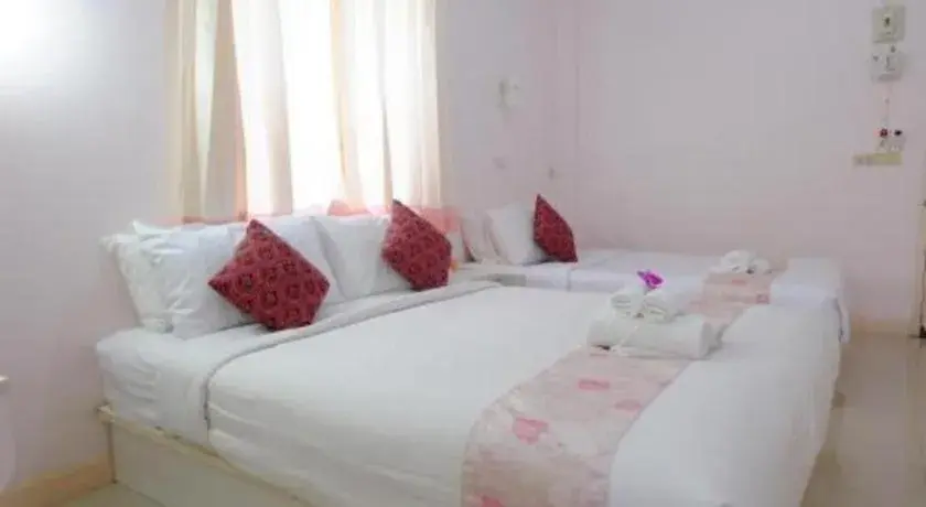 Bed in Wiangphumin Hotel Bed in Wiangphumin Hotel