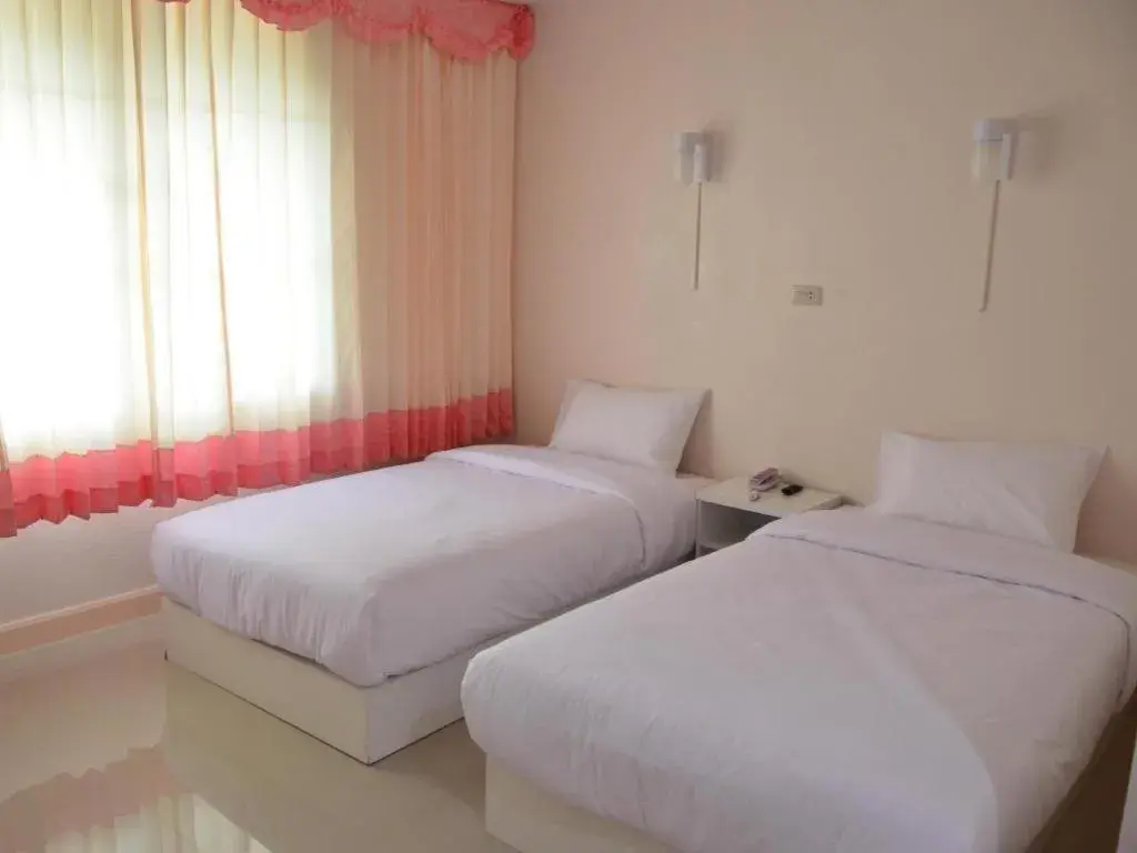 Bed in Wiangphumin Hotel Bed in Wiangphumin Hotel