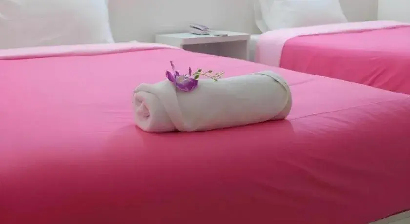 Bed in Wiangphumin Hotel Bed in Wiangphumin Hotel