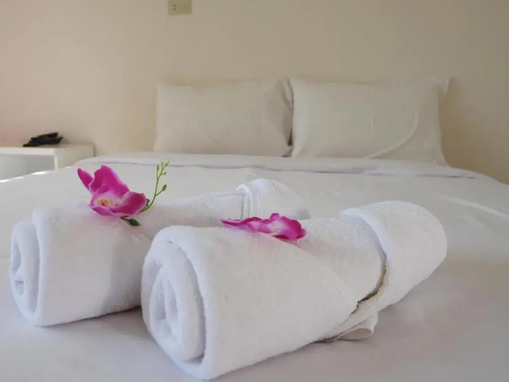 Bed in Wiangphumin Hotel Bed in Wiangphumin Hotel