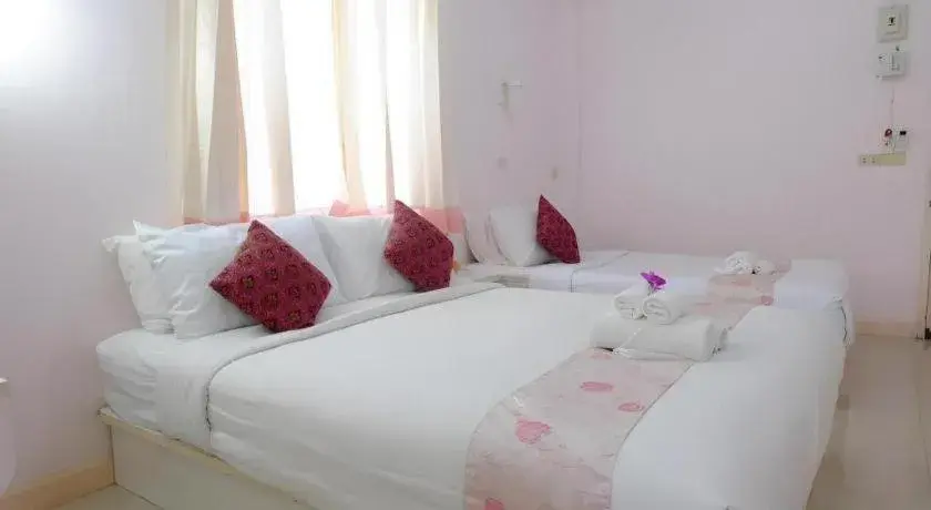 Bed in Wiangphumin Hotel Bed in Wiangphumin Hotel