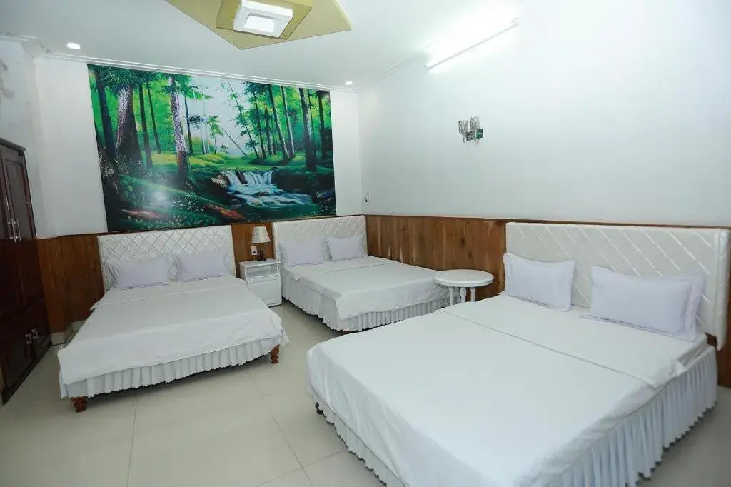 Bed in Thanh Long Hotel Bed in Thanh Long Hotel