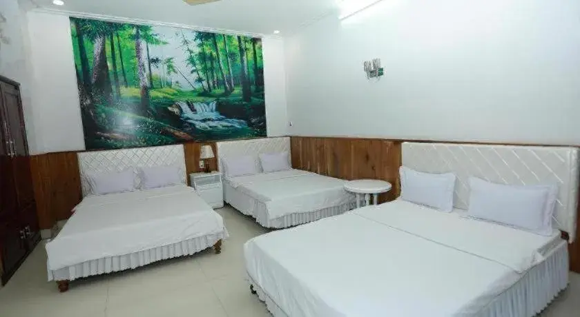 Bed in Thanh Long Hotel Bed in Thanh Long Hotel