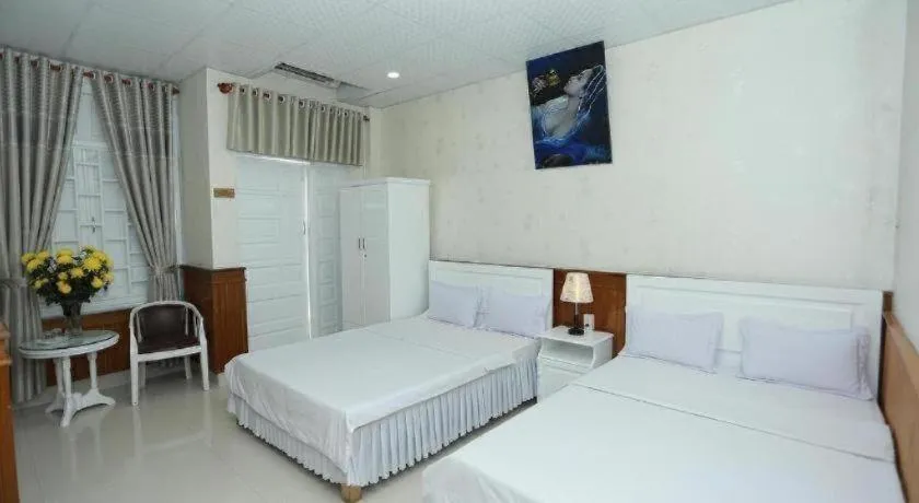 Bed in Thanh Long Hotel