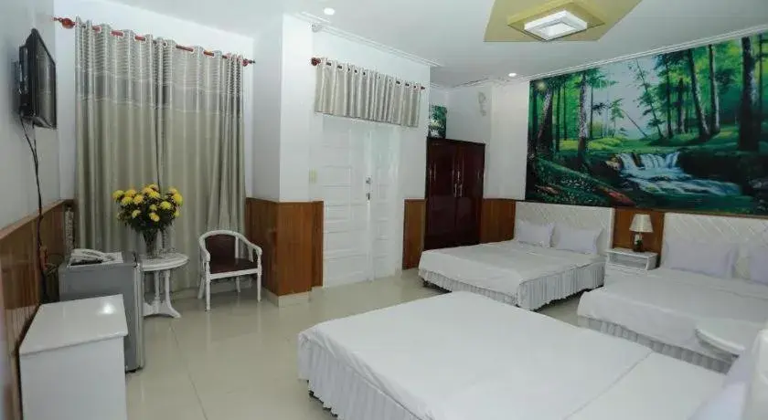 Bed in Thanh Long Hotel Bed in Thanh Long Hotel