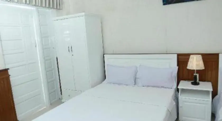 Bed in Thanh Long Hotel Bed in Thanh Long Hotel