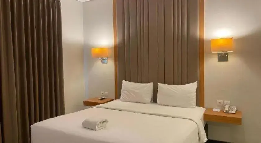 Bed in D'Season Premiere Hotel Bed in D'Season Premiere Hotel