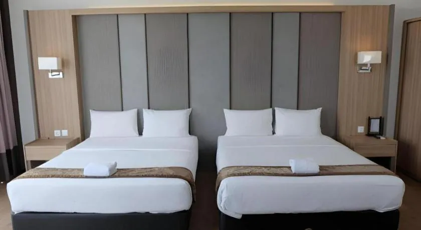 Bed in D'Season Premiere Hotel