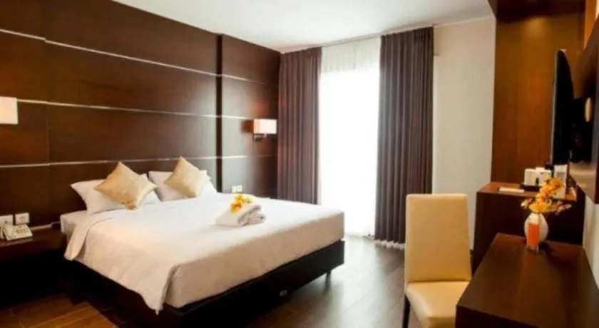 Bed in D'Season Premiere Hotel