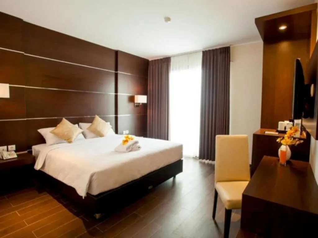 Bed in D'Season Premiere Hotel