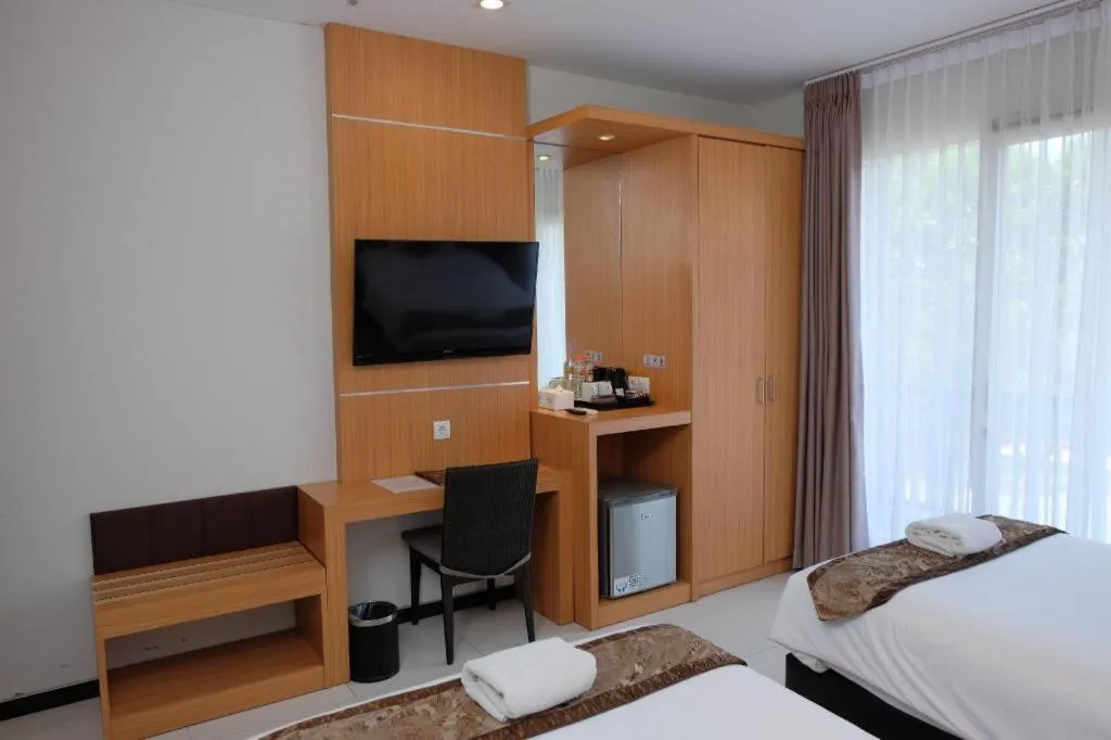 Bed in D'Season Premiere Hotel