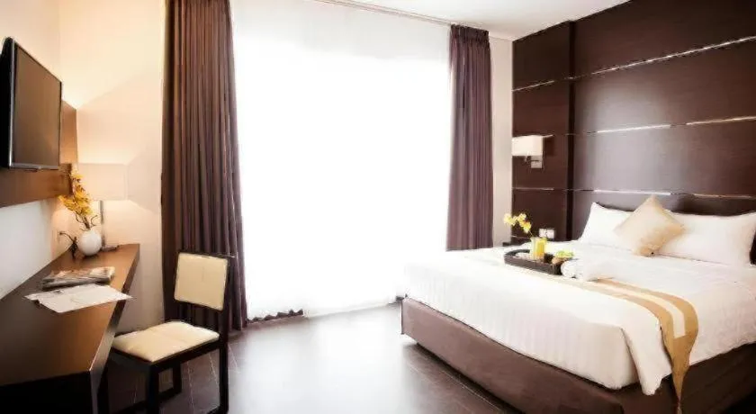 Bed in D'Season Premiere Hotel