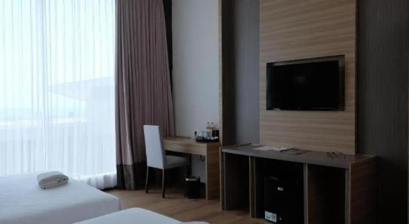 Bed in D'Season Premiere Hotel