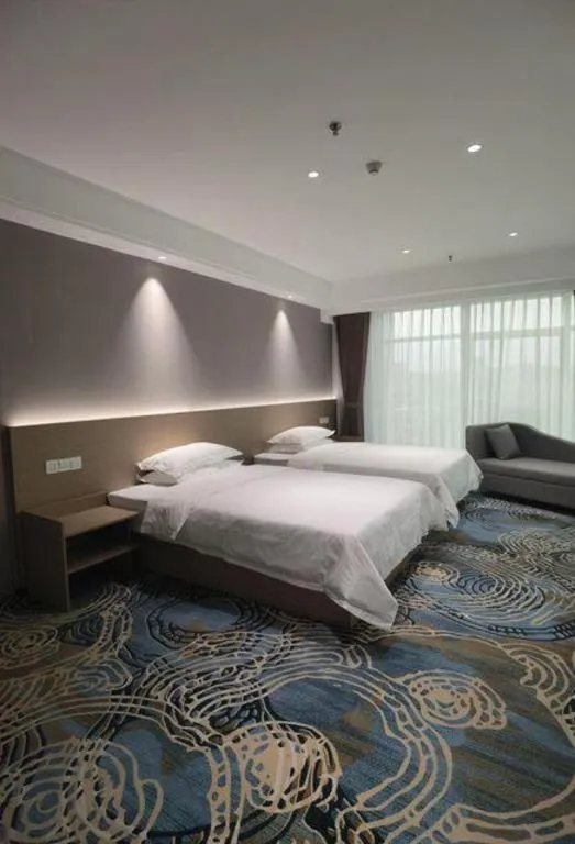 Bed in Grand Nest Hotel (Tang Jia Wan Beach)