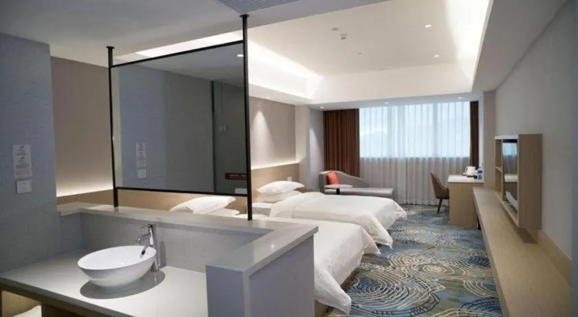Bed in Grand Nest Hotel (Tang Jia Wan Beach)