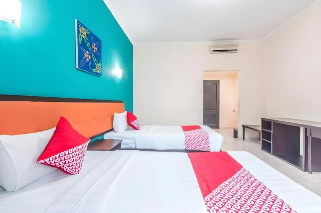 Bed in Ole Suite Hotel