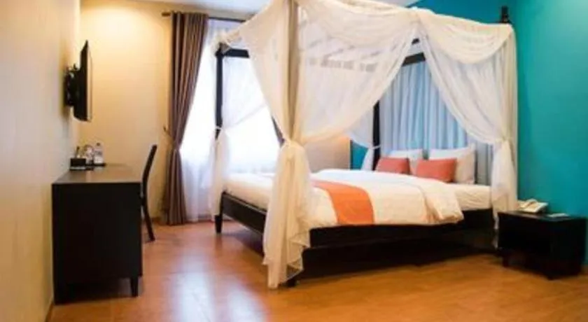 Bed in Ole Suite Hotel