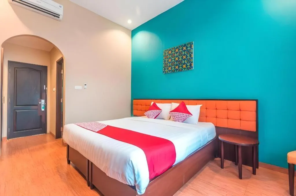 Bed in Ole Suite Hotel