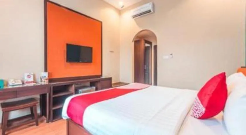 Bed in Ole Suite Hotel