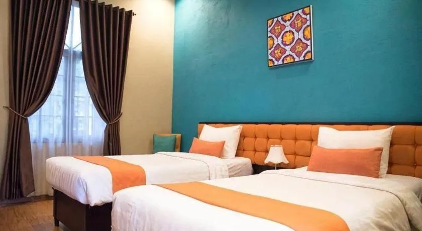 Bed in Ole Suite Hotel