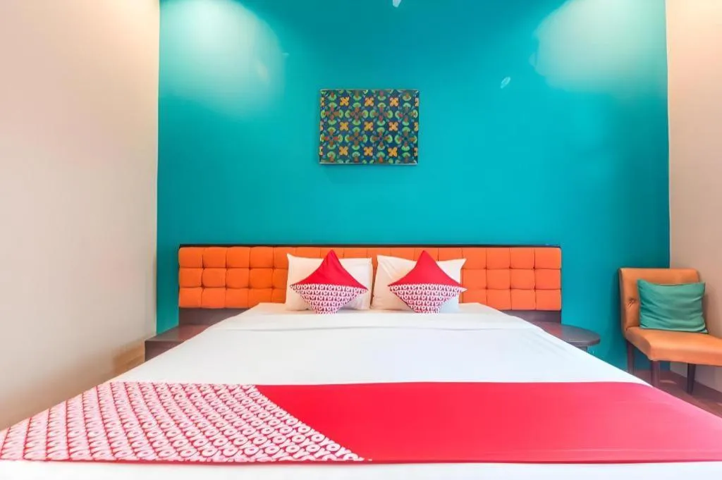 Bed in Ole Suite Hotel