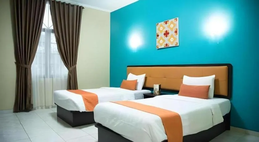 Bed in Ole Suite Hotel