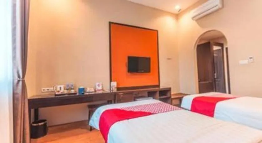 Bed in Ole Suite Hotel