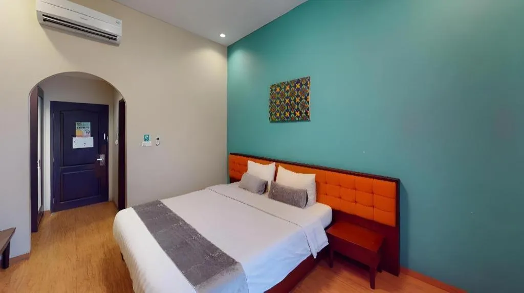 Bed in Ole Suite Hotel