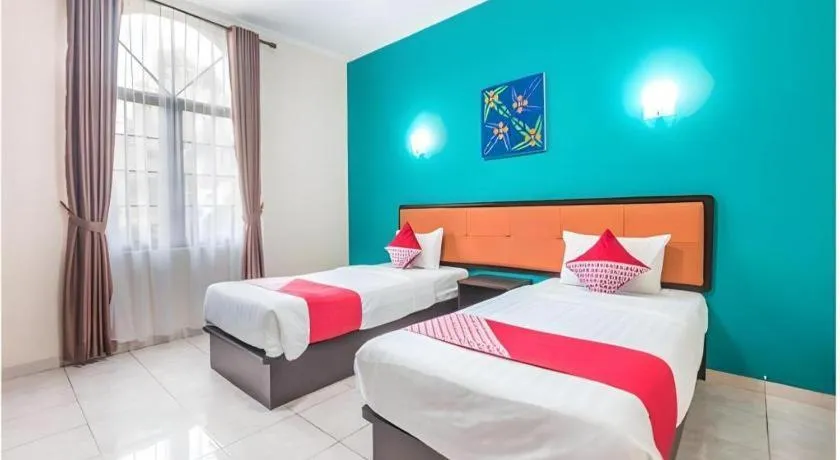 Bed in Ole Suite Hotel